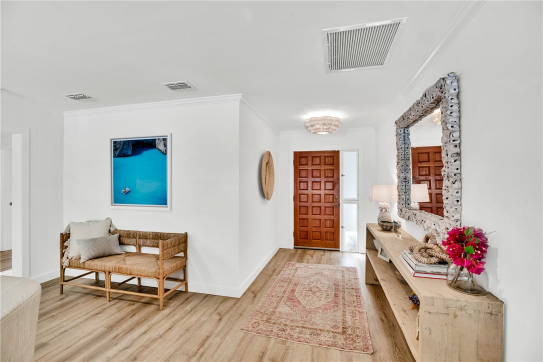 1830 East Sandpiper Road Vero Beach, FL 32963 - Photo 3 of 36 a bedroom with furniture and a window