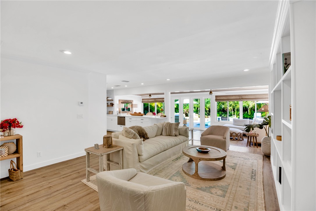 1830 East Sandpiper Road Vero Beach, FL 32963 - Photo 8 of 36 a living room with furniture and a large window