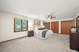 2130 Mallard Drive Northbrook, IL 60062 - Photo 11 of 28 a spacious bedroom with a large bed and a window