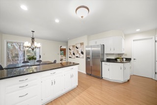 2130 Mallard Drive Northbrook, IL 60062 - Photo 18 of 28 a kitchen with refrigerator and cabinets