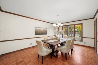 2130 Mallard Drive Northbrook, IL 60062 - Photo 20 of 28 a view of a dining room with furniture window and wooden floor