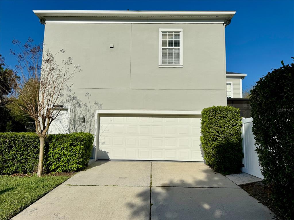 1328 Celebration Avenue Celebration, FL 34747 - Photo 26 of 26 a view of a garage