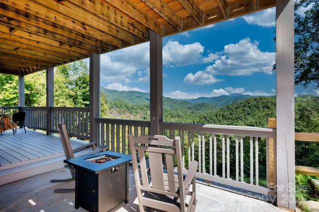 a view of a two chairs in the deck