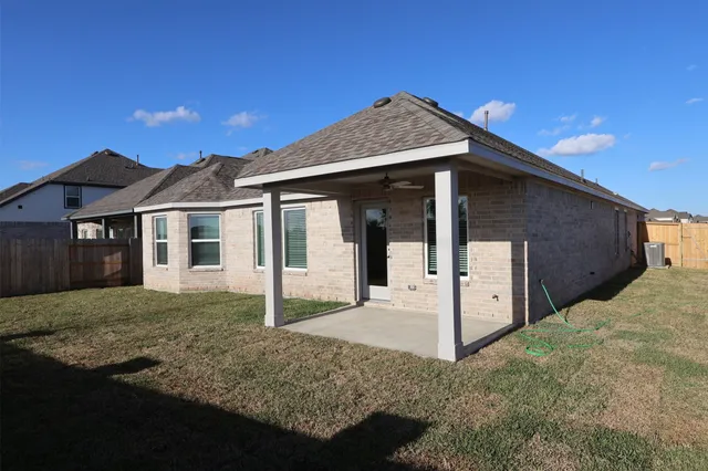 a front view of a house with yard