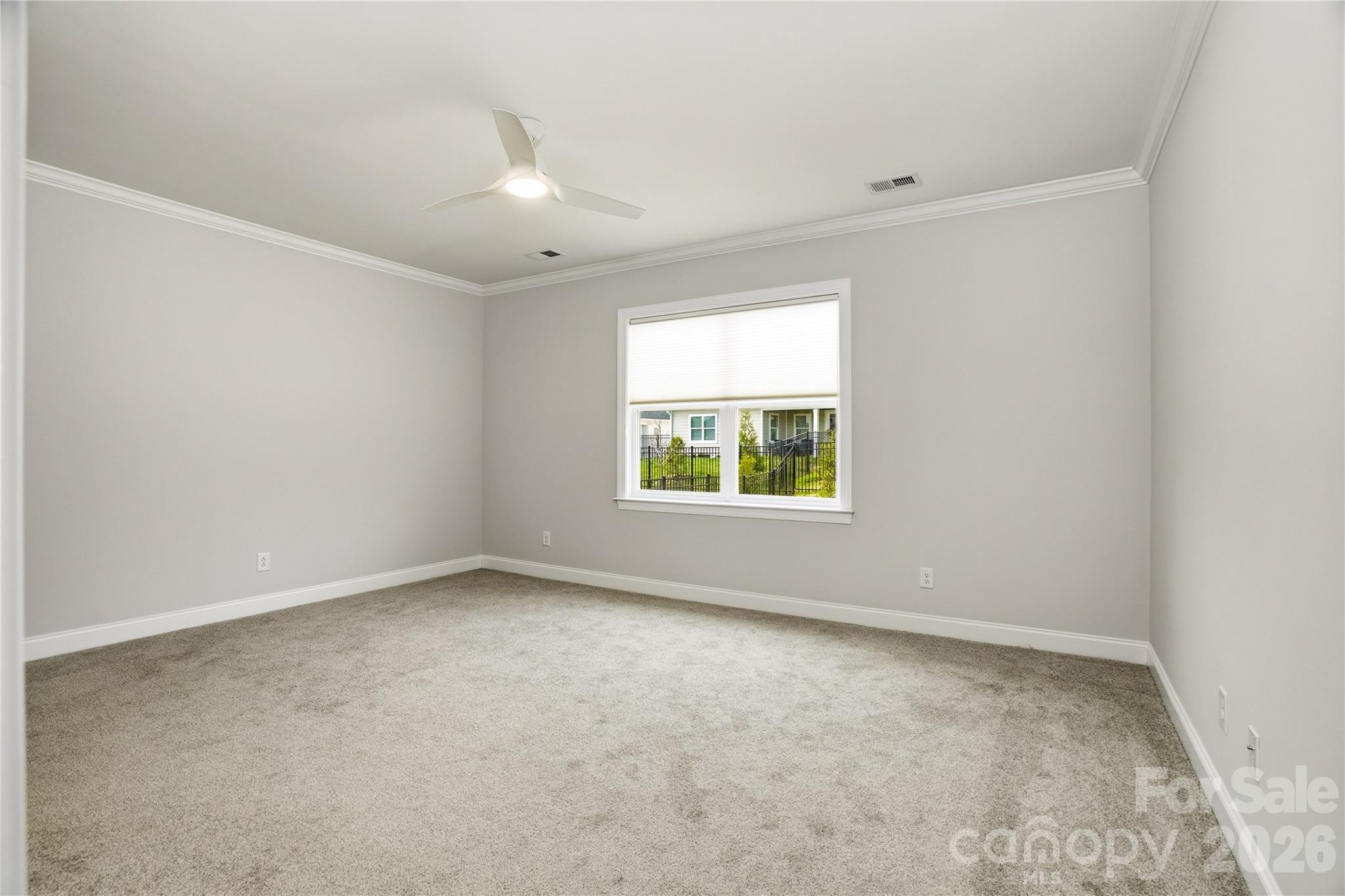 5562 Caneel Lane Denver, NC 28037 - Photo 19 of 44 an empty room with windows