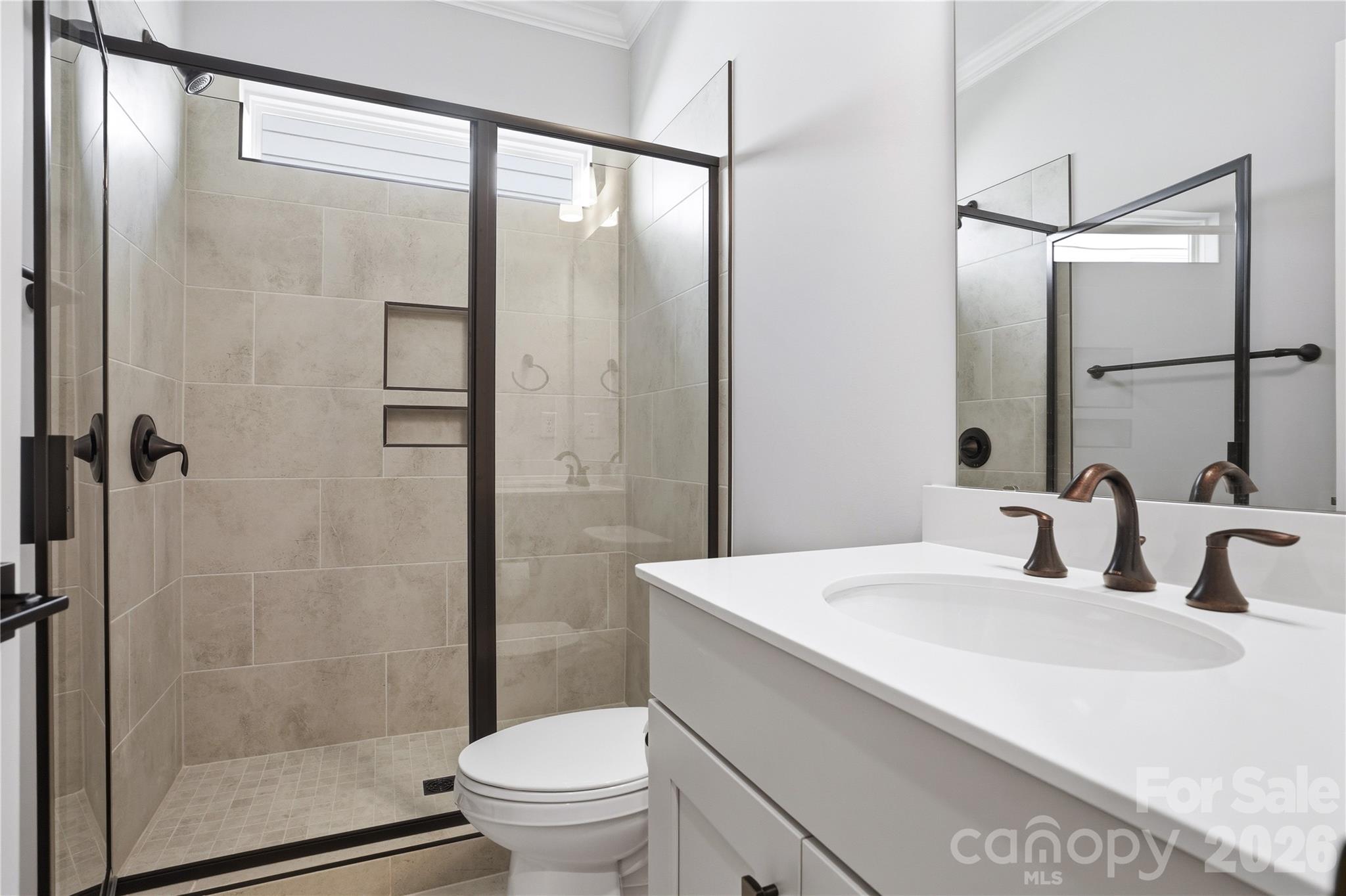 5562 Caneel Lane Denver, NC 28037 - Photo 30 of 44 a bathroom with a sink toilet and shower