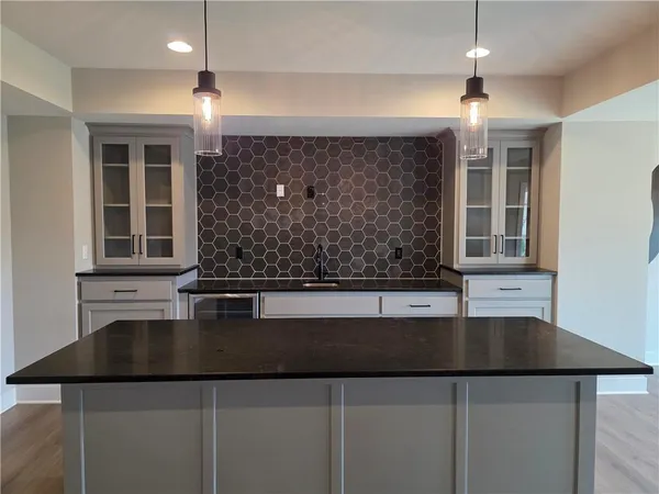 $725,000 | 1205 Hampton Drive, Raymore, MO 64083