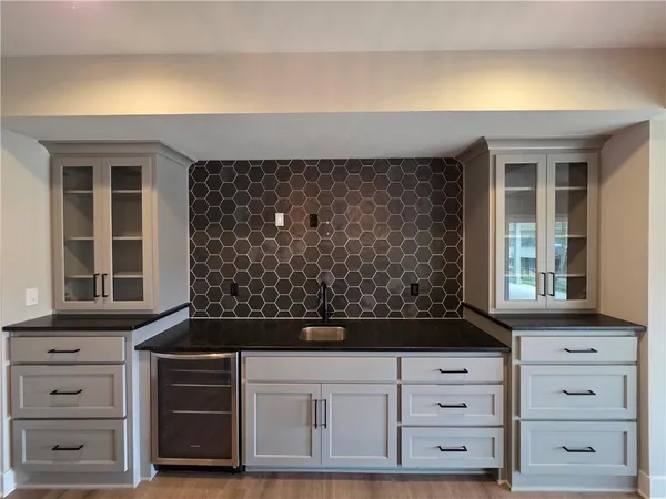 $725,000 | 1205 Hampton Drive, Raymore, MO 64083