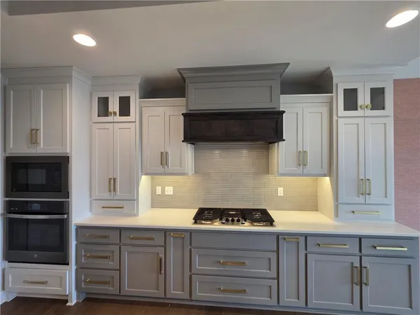 $725,000 | 1205 Hampton Drive, Raymore, MO 64083