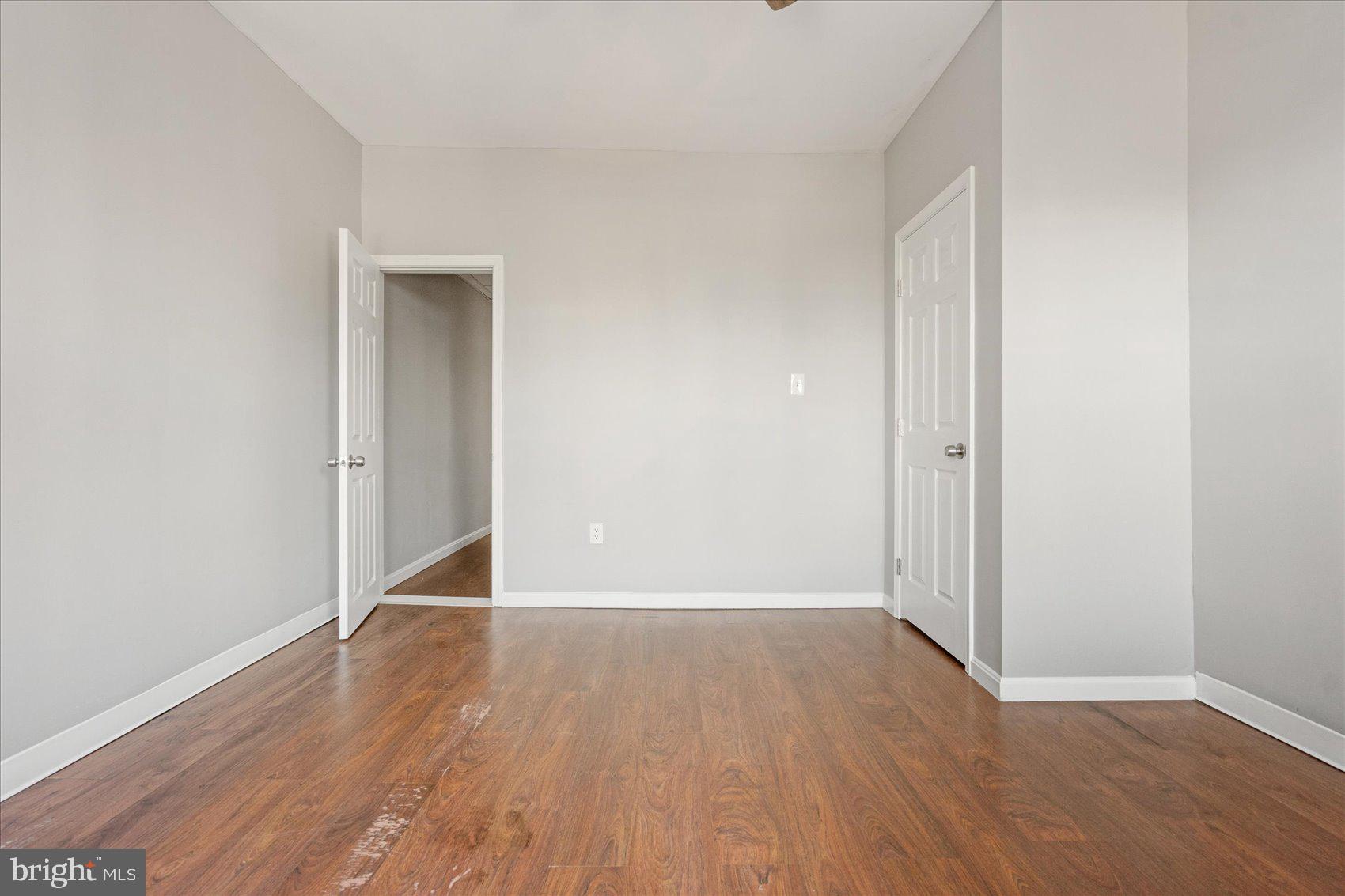 3526 Old York Road Baltimore, MD 21218 - Photo 19 of 33 wooden floor in an empty room