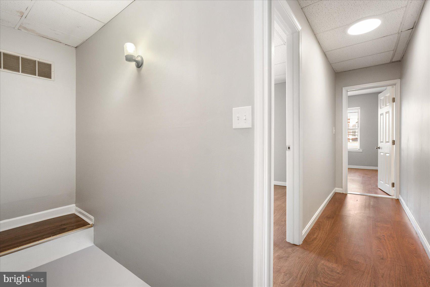 3526 Old York Road Baltimore, MD 21218 - Photo 27 of 33 a view of a hallway with wooden floor