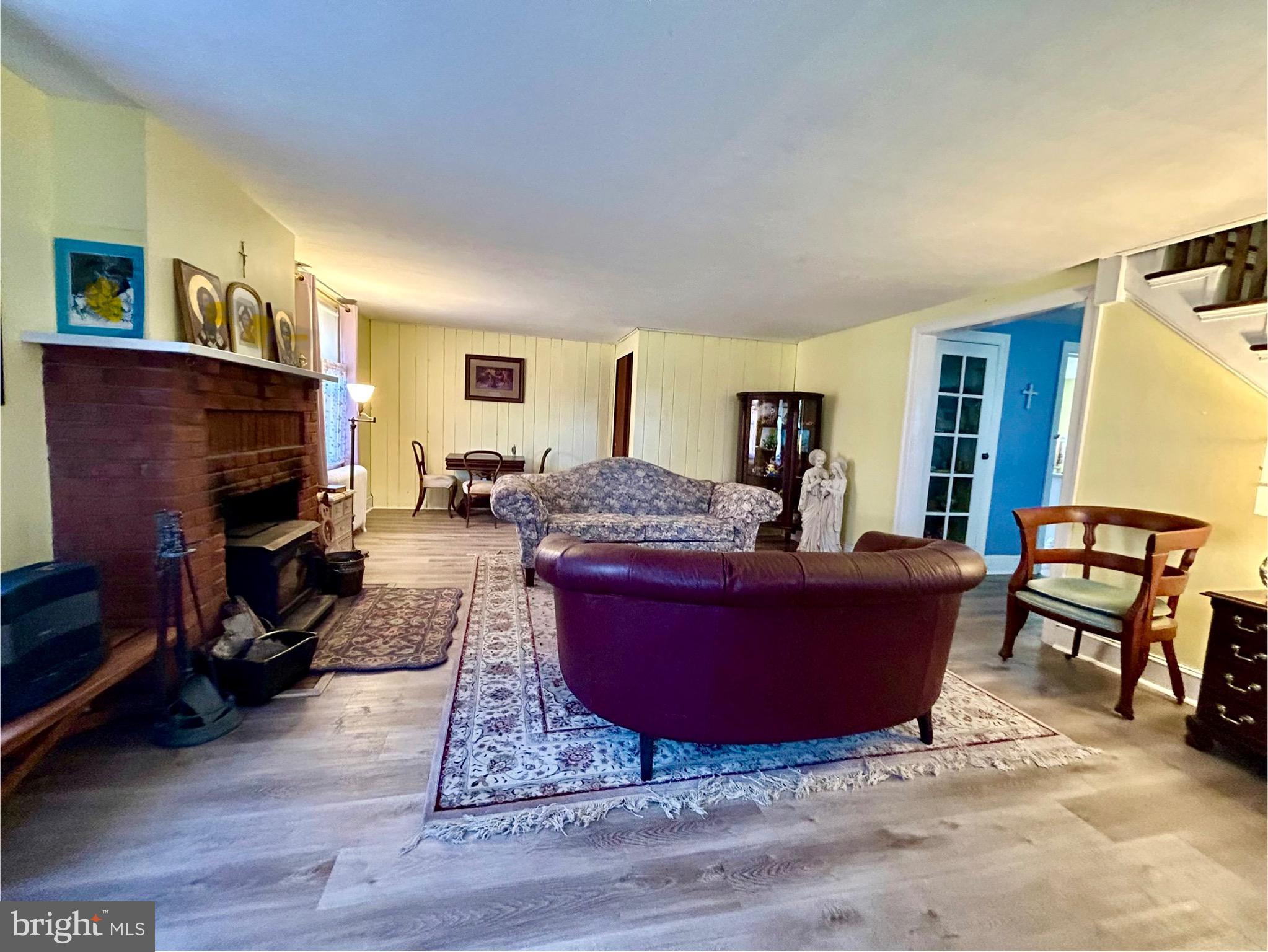 2415 Second Street Pike Newtown, PA 18940 - Photo 6 of 51 a living room with furniture and a fireplace