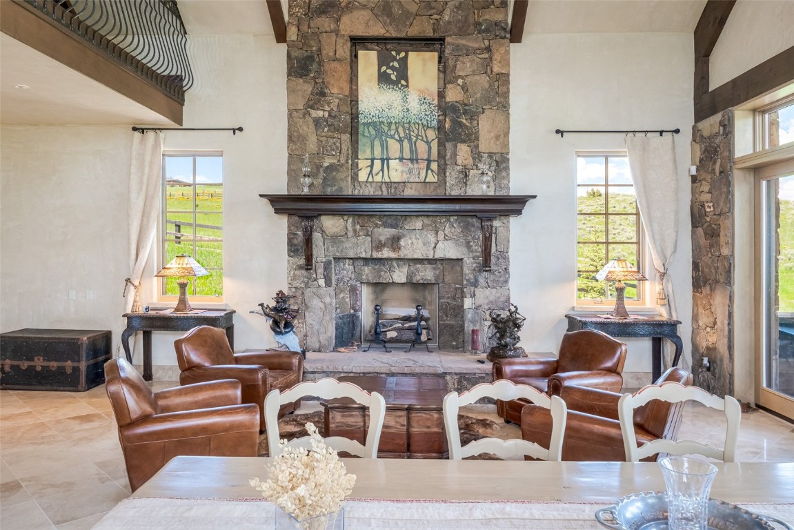 30855 Emerald Ridge Steamboat Springs, CO 80487 - Photo 16 of 50 a living room with furniture and a fireplace