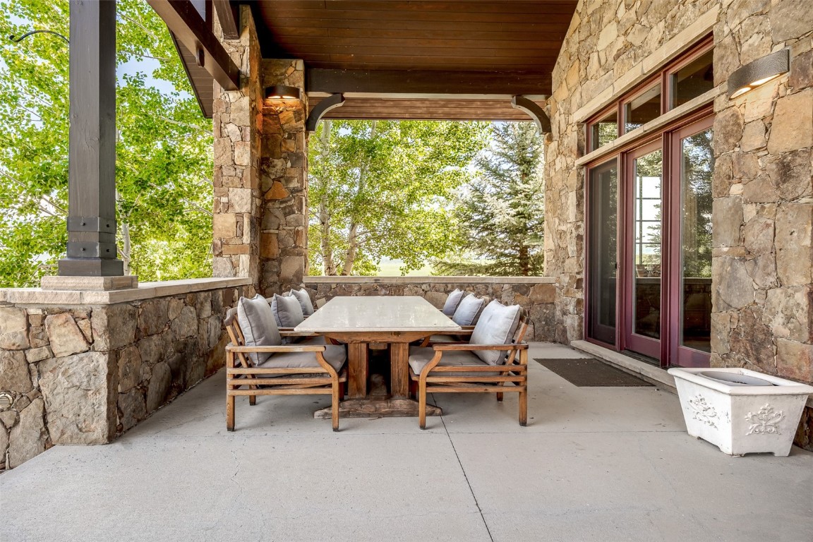 30855 Emerald Ridge Steamboat Springs, CO 80487 - Photo 18 of 50 a outdoor living space with furniture and a garden