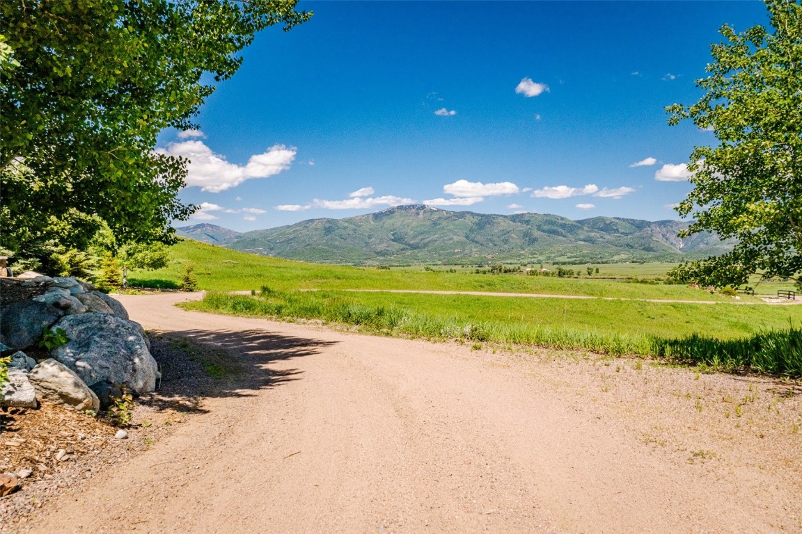 30855 Emerald Ridge Steamboat Springs, CO 80487 - Photo 20 of 50 a view of a lake with a beach