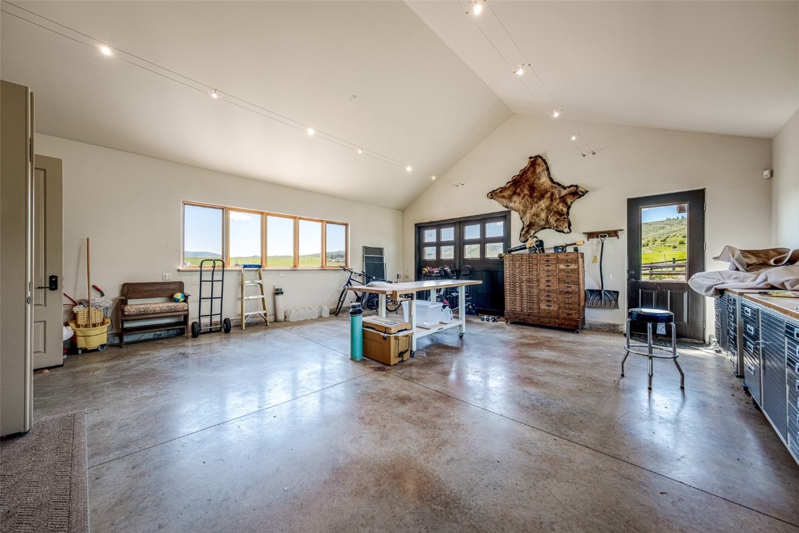 30855 Emerald Ridge Steamboat Springs, CO 80487 - Photo 30 of 50 a living room with furniture and a flat screen tv