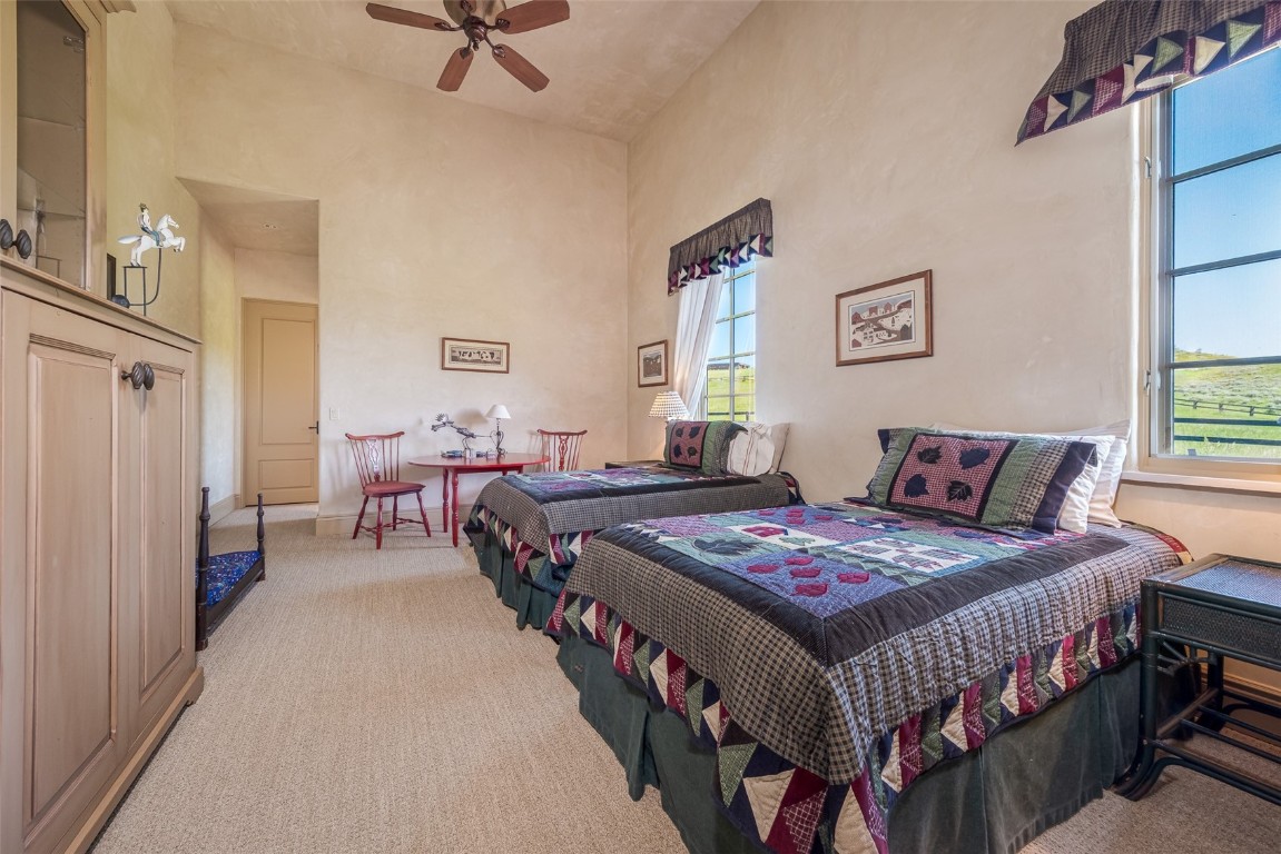 30855 Emerald Ridge Steamboat Springs, CO 80487 - Photo 38 of 50 a bedroom with bed and a window