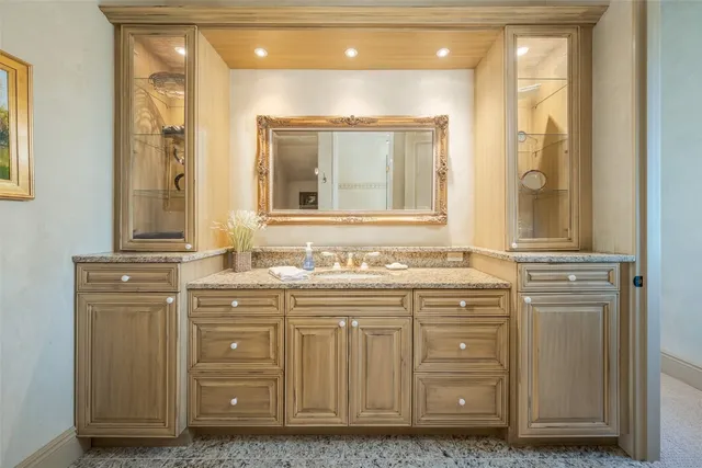 a large bedroom with furniture