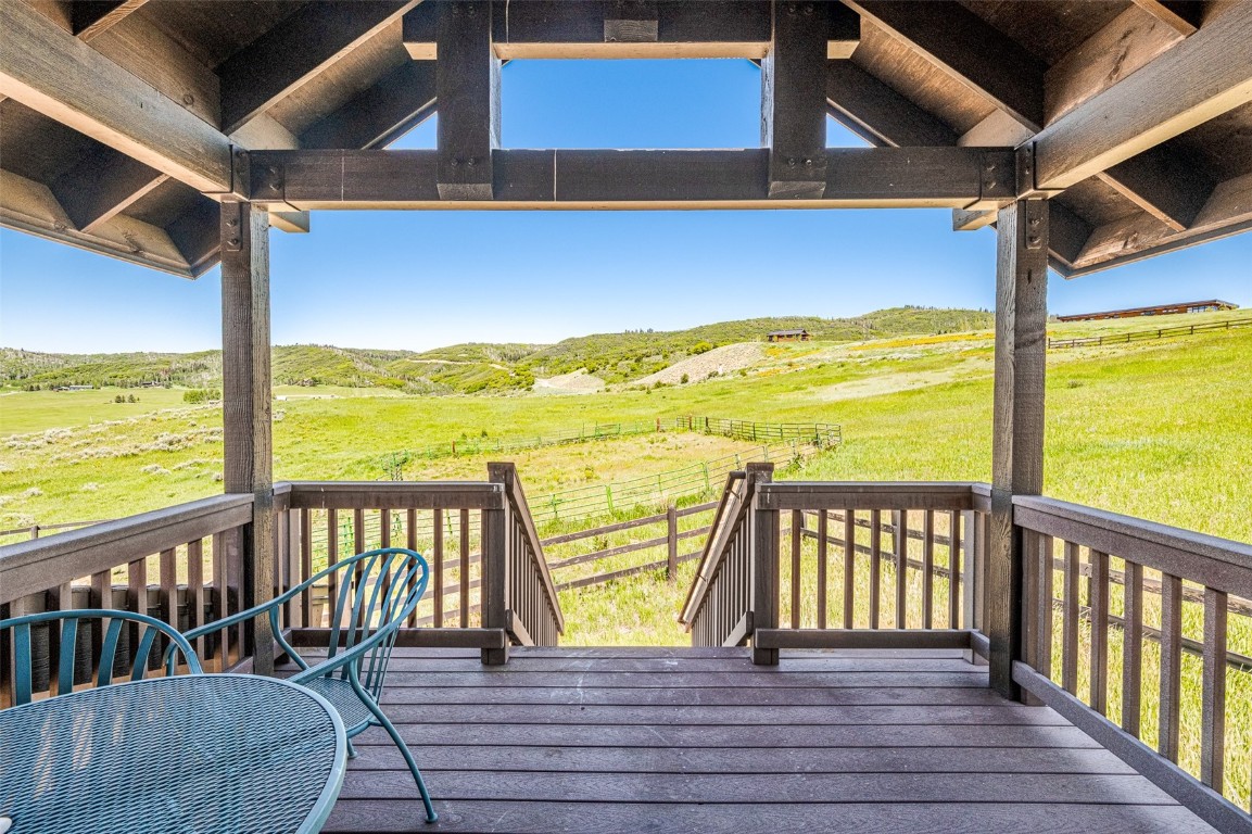 30855 Emerald Ridge Steamboat Springs, CO 80487 - Photo 43 of 50 a view of a balcony with wooden floor