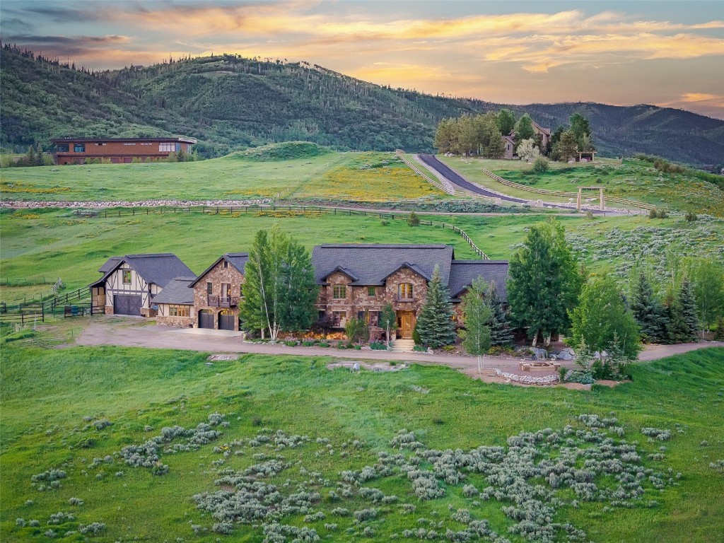 30855 Emerald Ridge Steamboat Springs, CO 80487 - Photo 44 of 50 a view of an house with backyard space and garden