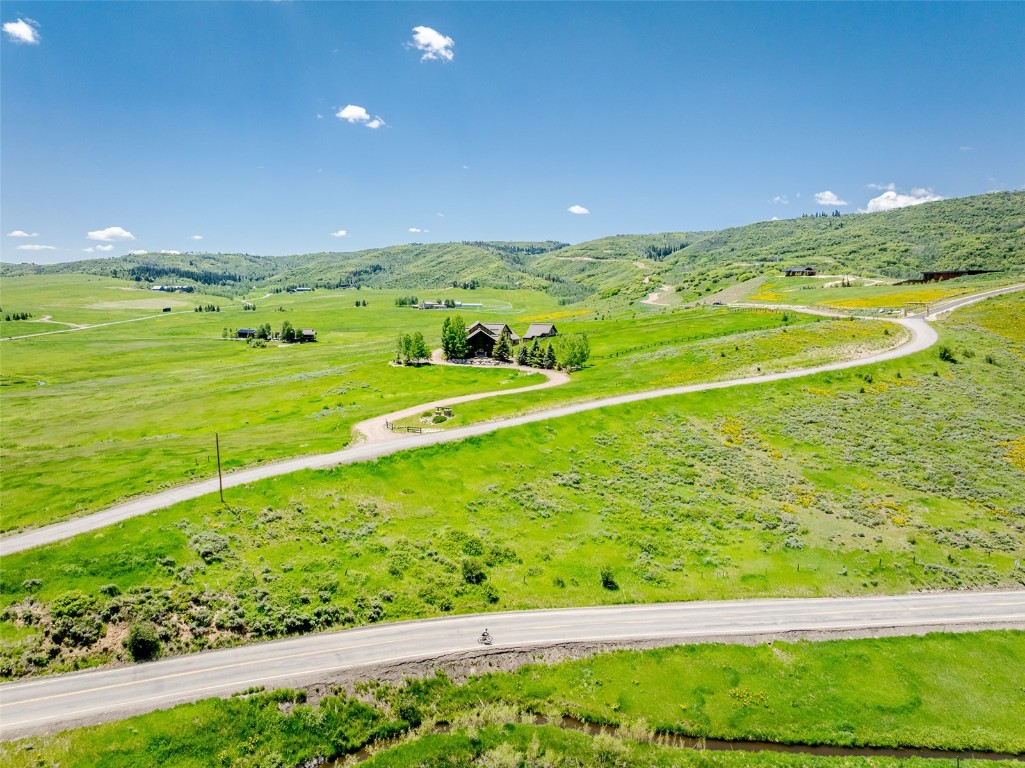 30855 Emerald Ridge Steamboat Springs, CO 80487 - Photo 46 of 50 a view of an ocean and a yard