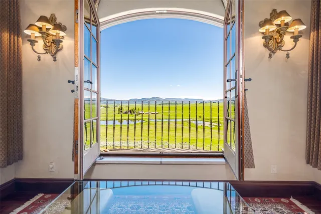 a view of staircase with window