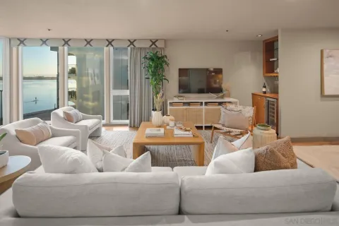 a living room with granite countertop furniture and a fireplace