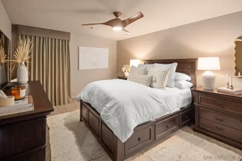 a bathroom with a sink a mirror and a shower