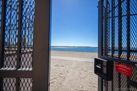a view of a swimming pool with a lounge chair