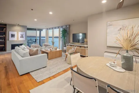 a living room with furniture and a table