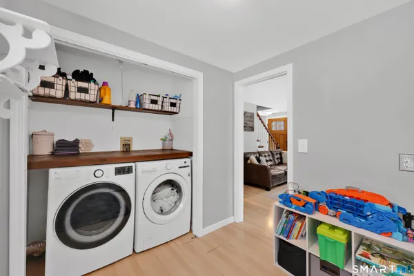 a view of a street with large trees
