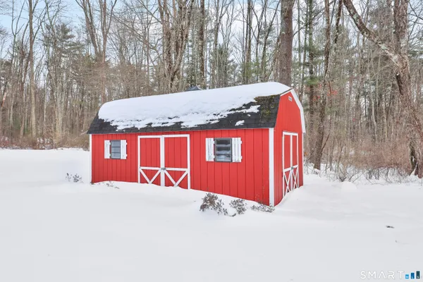a view of snow on the side of road
