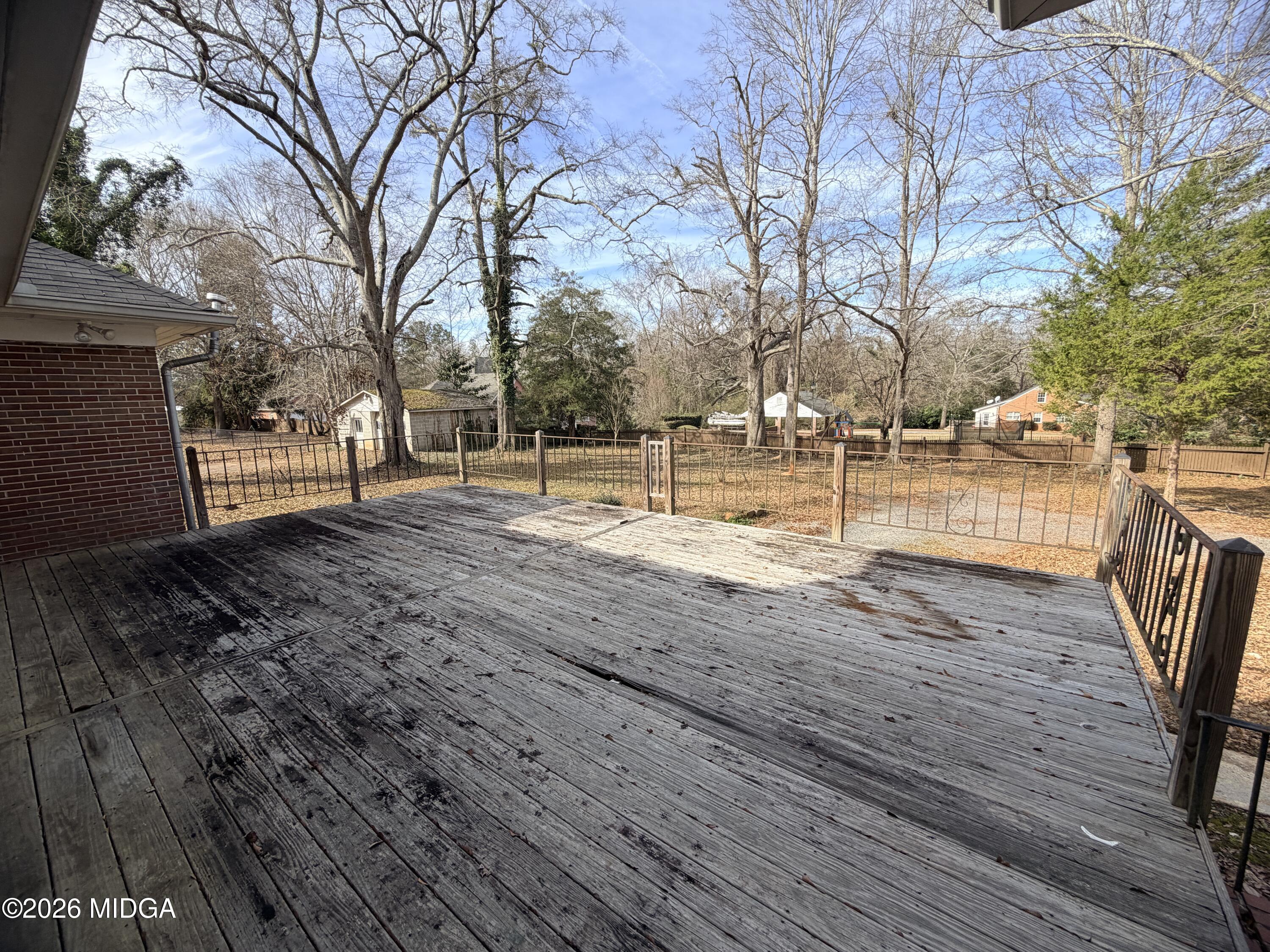 419 West Johnston Street Forsyth, GA 31029 - Photo 27 of 34 a view of outdoor space with wooden floor