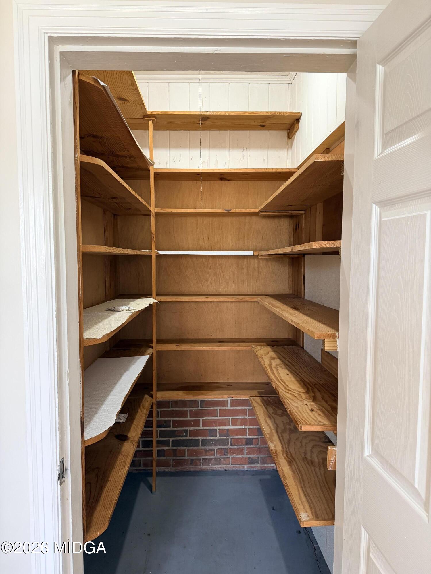 419 West Johnston Street Forsyth, GA 31029 - Photo 32 of 34 a view of walk in closet with empty racks