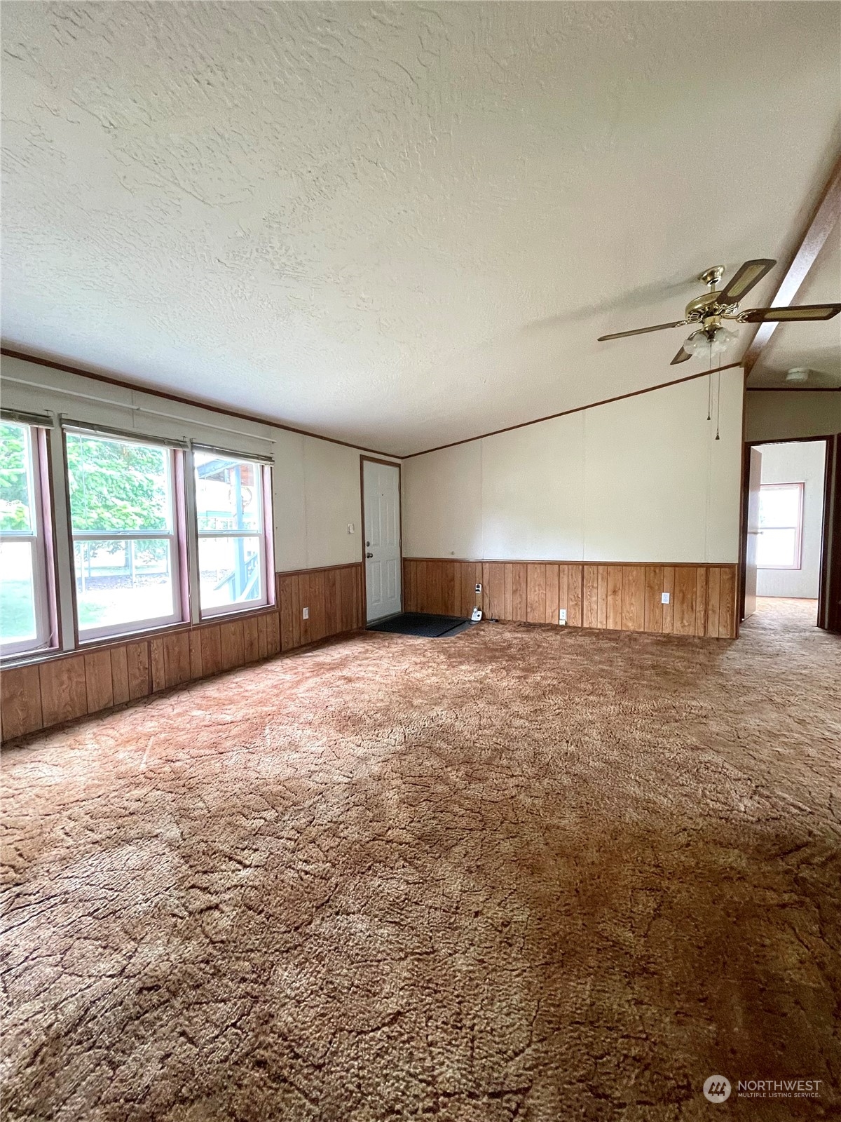 813 Conconully Road Okanogan, WA 98840 - Photo 3 of 40 an empty room with windows