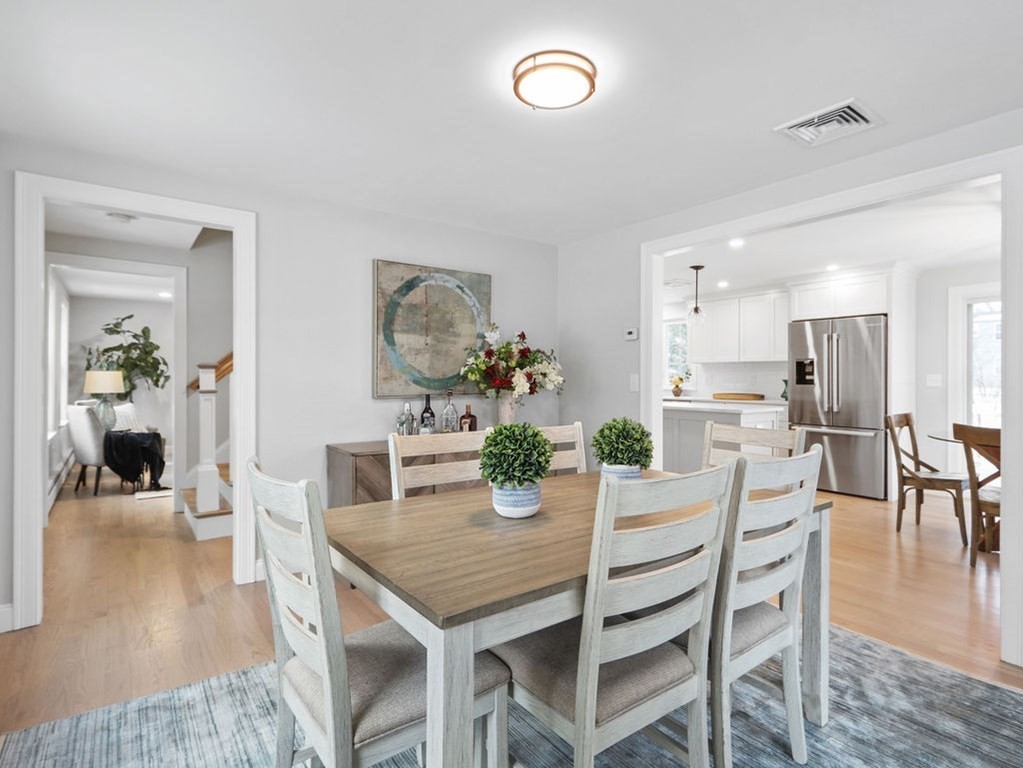 19 Crest Road Natick, MA 01760 - Photo 13 of 40 a dining room with furniture and wooden floor
