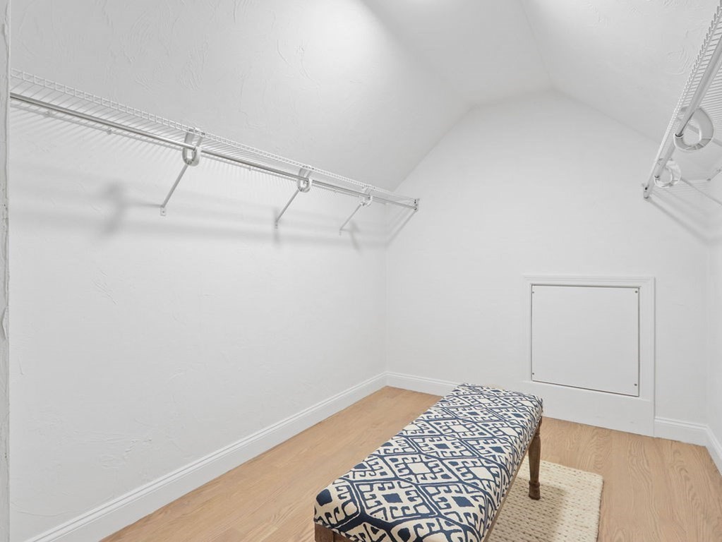 19 Crest Road Natick, MA 01760 - Photo 20 of 40 a bedroom with a bed and a walk in closet