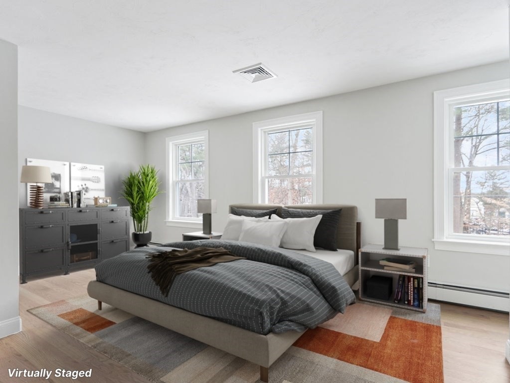 19 Crest Road Natick, MA 01760 - Photo 24 of 40 a bedroom with a bed lamp and window
