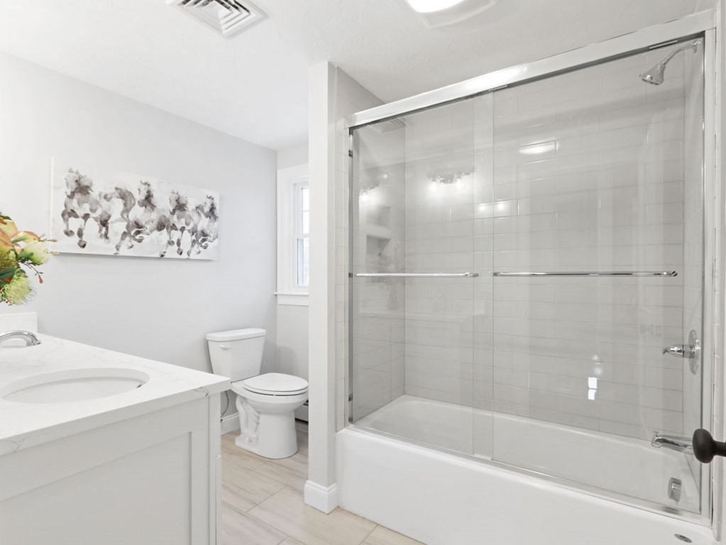 19 Crest Road Natick, MA 01760 - Photo 26 of 40 a bathroom with a bathtub and a toilet