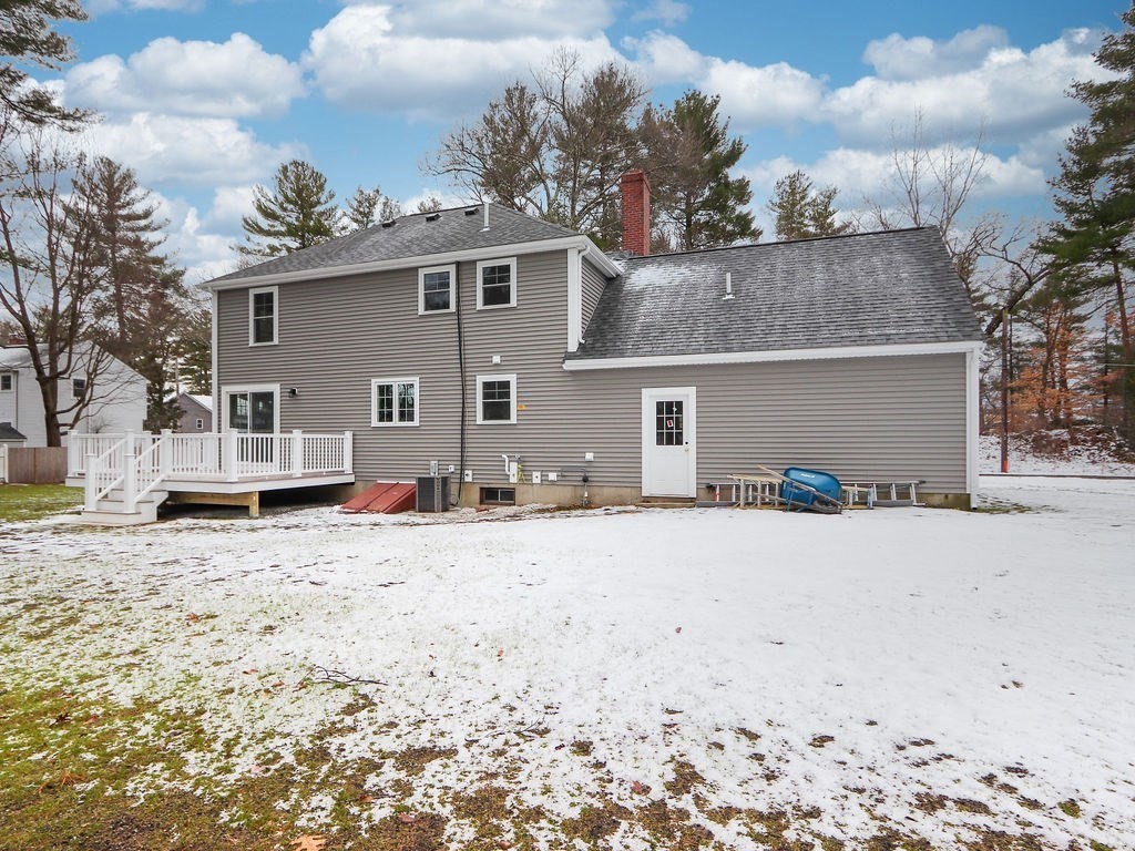 19 Crest Road Natick, MA 01760 - Photo 30 of 40 a view of a house with a snow on the road