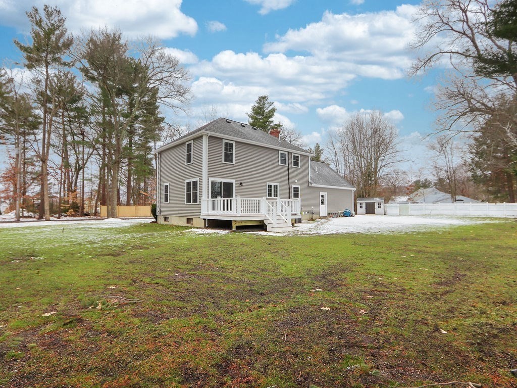 19 Crest Road Natick, MA 01760 - Photo 32 of 40 a view of a house with a yard
