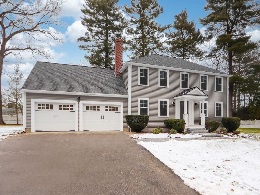 19 Crest Road Natick, MA 01760 - Photo 35 of 40 a front view of a house with a yard