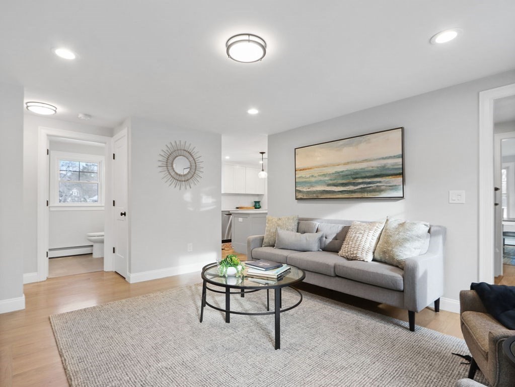 19 Crest Road Natick, MA 01760 - Photo 4 of 40 a living room with furniture and a large window