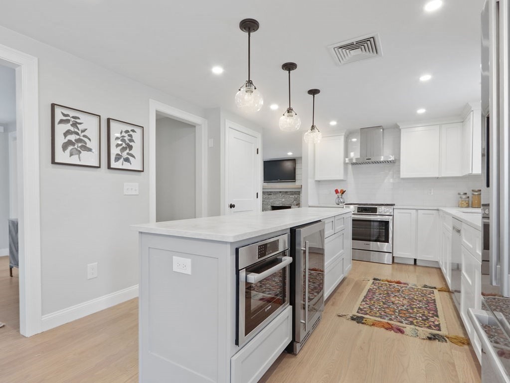 19 Crest Road Natick, MA 01760 - Photo 8 of 40 a kitchen with a stove and a sink