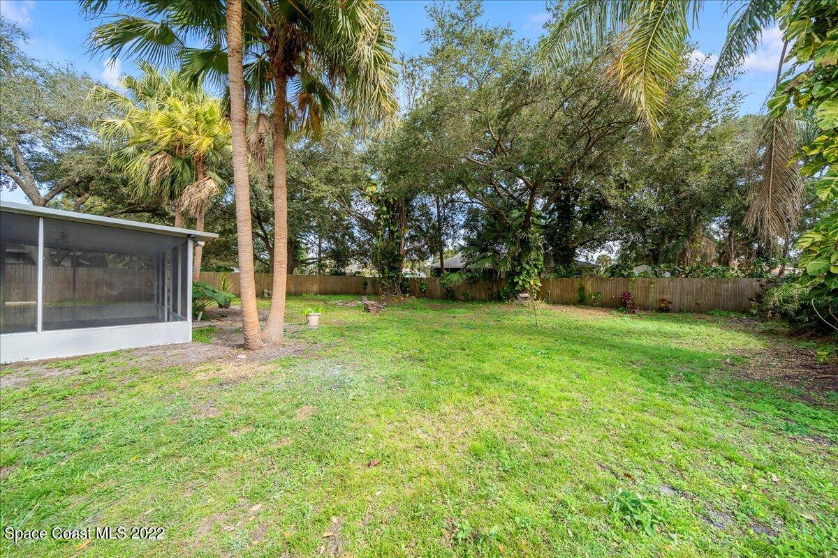 6165 Corning Road Cocoa, FL 32927 - Photo 26 of 44 a view of a yard with a house