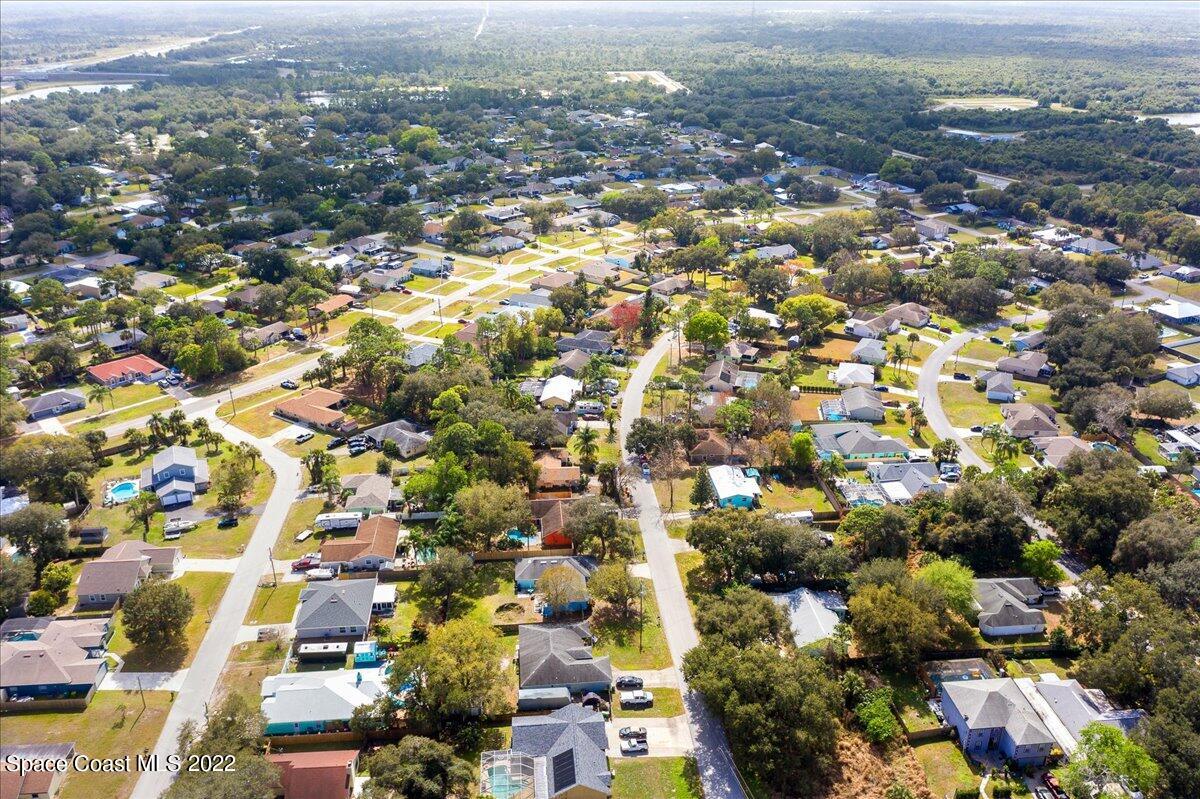 6165 Corning Road Cocoa, FL 32927 - Photo 41 of 44 an aerial view of residential houses with city view