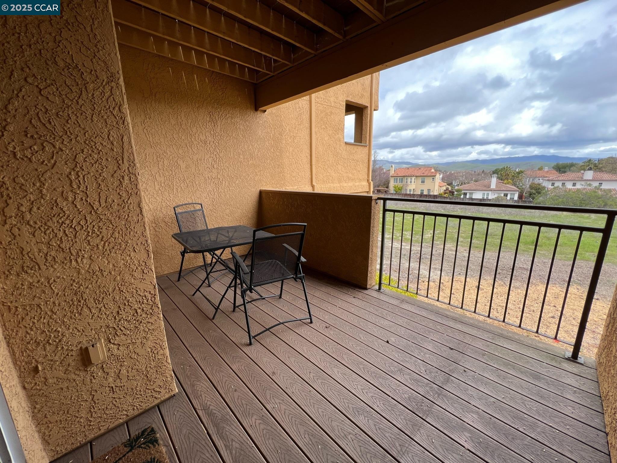 460 Bollinger Canyon Lane, Unit 286 San Ramon, CA 94582 - Photo 11 of 14 a view of balcony with wooden floor and outdoor seating