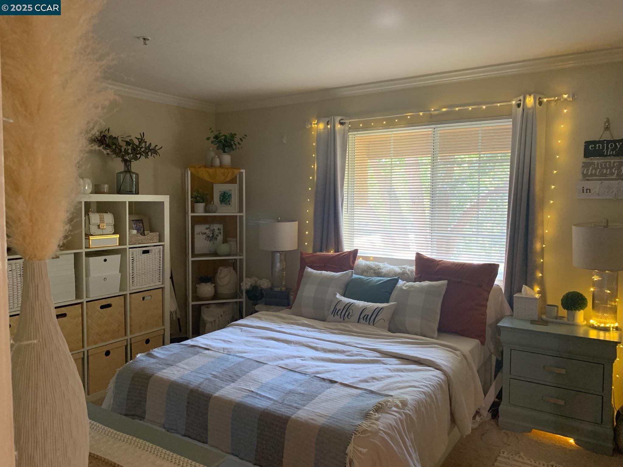 460 Bollinger Canyon Lane, Unit 286 San Ramon, CA 94582 - Photo 8 of 14 a bedroom with a bed and large window