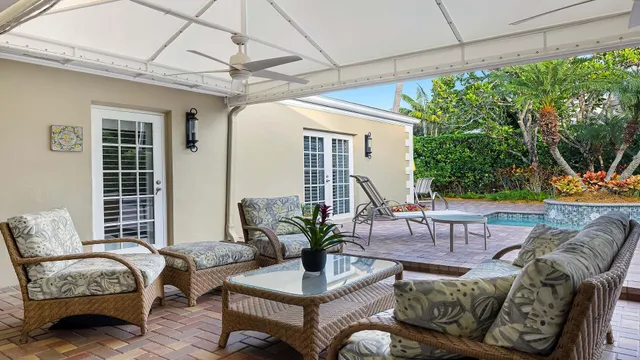 a front view of house and yard with seating space