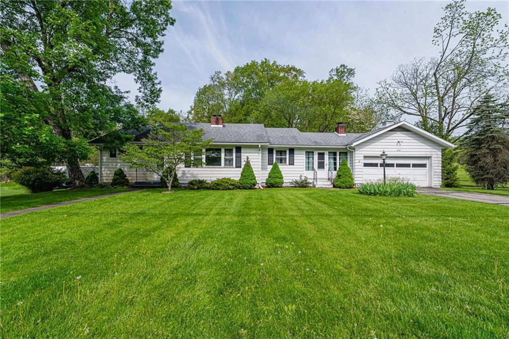 520 North 9th Street Indiana, PA 15701 - Photo 1 of 29 a front view of a house with a yard and trees